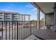 Balcony with table and chairs, overlooking parking lot and building at 5905 South Kings Hwy. # A246, Myrtle Beach, SC 29575
