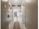 Bright hallway with tile floors and coastal decor at 5905 South Kings Hwy. # A246, Myrtle Beach, SC 29575