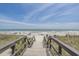 Wooden walkway leading to a beautiful sandy beach at 5905 South Kings Hwy. # A246, Myrtle Beach, SC 29575