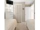 Two twin beds in a well-lit bedroom with light-colored walls and carpeting at 5905 South Kings Hwy. # A246, Myrtle Beach, SC 29575
