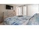 Bedroom with dresser and large bed, beach-themed decor at 5905 South Kings Hwy. # A246, Myrtle Beach, SC 29575