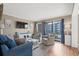 Comfortable living room with ocean views and balcony access at 5905 South Kings Hwy. # A246, Myrtle Beach, SC 29575