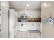 Well-equipped kitchen with white cabinets, granite countertops, and stainless steel appliances at 5905 South Kings Hwy. # A246, Myrtle Beach, SC 29575