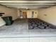 Attached garage with a concrete floor and space for storage at 1188 Fairway Ln. # 7, Conway, SC 29526