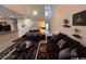 Spacious living room with high ceilings, two sofas, and a coffee table at 1188 Fairway Ln. # 7, Conway, SC 29526