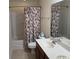 Main bathroom includes double vanity, bathtub, and shower at 1188 Fairway Ln. # 7, Conway, SC 29526