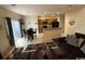 Open kitchen features a breakfast bar, dark cabinetry, and black appliances at 1188 Fairway Ln. # 7, Conway, SC 29526