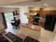 Bright kitchen boasts an island, ample cabinetry, and a view to the dining area at 1188 Fairway Ln. # 7, Conway, SC 29526