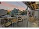 Relaxing deck with wicker chairs, a hammock, and sunset views at 6001 - 1870 S Kings Hwy., Myrtle Beach, SC 29575