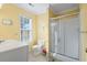 Bright bathroom with a shower/tub combo and window at 6001 - 1870 S Kings Hwy., Myrtle Beach, SC 29575