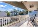 Deck overlooking neighboring houses and trees at 6001 - 1870 S Kings Hwy., Myrtle Beach, SC 29575