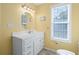 Bright bathroom with white vanity and large window at 6001 - 1870 S Kings Hwy., Myrtle Beach, SC 29575