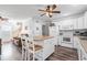 White kitchen with island, stainless steel appliances, and hardwood floors at 6001 - 1870 S Kings Hwy., Myrtle Beach, SC 29575