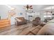 Open living room with hardwood floors, sofas and view of the kitchen at 6001 - 1870 S Kings Hwy., Myrtle Beach, SC 29575