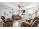 Bright living room with hardwood floors, sofas, and a view of the entryway at 6001 - 1870 S Kings Hwy., Myrtle Beach, SC 29575