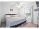 Spacious bedroom with a large bed, window, and ceiling fan at 6001 - 1870 S Kings Hwy., Myrtle Beach, SC 29575