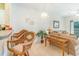 Living room with wicker chairs and a beige sofa at 1100 Commons Blvd. # 107, Myrtle Beach, SC 29572