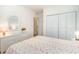 Bright bedroom with a double bed and white dresser at 1100 Commons Blvd. # 107, Myrtle Beach, SC 29572