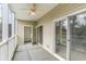 Screened porch with ceiling fan and access to water view at 1100 Commons Blvd. # 107, Myrtle Beach, SC 29572