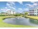 Scenic pond with a gazebo and fountain in a community setting at 1100 Commons Blvd. # 107, Myrtle Beach, SC 29572