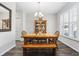 Bright dining area with wood table, chairs and built-in hutch at 160 Freeboard Ln. # 802, Carolina Shores, NC 28467