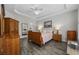 Large main bedroom with wood flooring, ceiling fan, and ample closet space at 160 Freeboard Ln. # 802, Carolina Shores, NC 28467