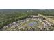 Community overview featuring a pond and homes at 160 Freeboard Ln. # 802, Carolina Shores, NC 28467