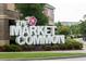 The Market Common shopping center sign with lush landscaping at 320 Palmetto Sand Loop, Conway, SC 29527