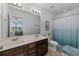 Bathroom with double vanity and a shower/tub combo at 232 Castle Dr. # 232, Myrtle Beach, SC 29579