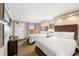 Well-lit bedroom featuring two twin beds and ocean views at 6900 N Ocean Blvd. N # 1238, Myrtle Beach, SC 29572