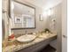 Bathroom featuring a granite countertop vanity and large mirror at 6900 N Ocean Blvd. N # 1238, Myrtle Beach, SC 29572