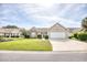 Single-story house with attached garage and manicured lawn at 812 Lalton Dr., Conway, SC 29526