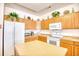Bright kitchen with an abundance of wood cabinets and counter space at 812 Lalton Dr., Conway, SC 29526