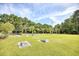Community lawn with cornhole and playground at 812 Lalton Dr., Conway, SC 29526