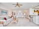 Open living room with neutral decor and view of kitchen and entryway at 812 Lalton Dr., Conway, SC 29526