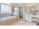 Bathroom features a shower, garden tub, and vanity at 505 Quincy Hall Dr., Myrtle Beach, SC 29579