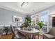Elegant dining room with large table and seating for six at 505 Quincy Hall Dr., Myrtle Beach, SC 29579