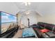 Home theater with sectional sofa, large screen TV, and exercise equipment at 505 Quincy Hall Dr., Myrtle Beach, SC 29579