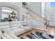 Living room with white sectional sofa and hardwood floors at 505 Quincy Hall Dr., Myrtle Beach, SC 29579