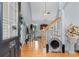 Bright entryway with hardwood floors and staircase at 505 Quincy Hall Dr., Myrtle Beach, SC 29579