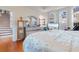 Main bedroom with hardwood floors and access to a staircase at 505 Quincy Hall Dr., Myrtle Beach, SC 29579
