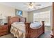 Bedroom with wooden bed frame and neutral decor at 505 Quincy Hall Dr., Myrtle Beach, SC 29579