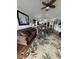 Open living area with hardwood floors and comfy seating at 1538 Lanterns Rest Rd. # 303, Myrtle Beach, SC 29579