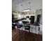 Open kitchen boasts granite counters and breakfast bar at 1538 Lanterns Rest Rd. # 303, Myrtle Beach, SC 29579