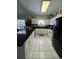 Modern kitchen with granite countertops and black appliances at 1538 Lanterns Rest Rd. # 303, Myrtle Beach, SC 29579