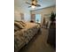 Relaxing bedroom with floral bedding and ceiling fan at 1538 Lanterns Rest Rd. # 303, Myrtle Beach, SC 29579