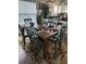 Charming dining area with a wood table and green chairs at 1538 Lanterns Rest Rd. # 303, Myrtle Beach, SC 29579