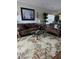 Spacious living room with brown sofas and coffee table at 1538 Lanterns Rest Rd. # 303, Myrtle Beach, SC 29579