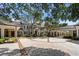 Grand two-story home with circular driveway and mature landscaping at 3601 Ocean Blvd. N, Myrtle Beach, SC 29577