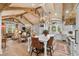 Open concept kitchen and living area with exposed beams and hardwood floors at 3601 Ocean Blvd. N, Myrtle Beach, SC 29577